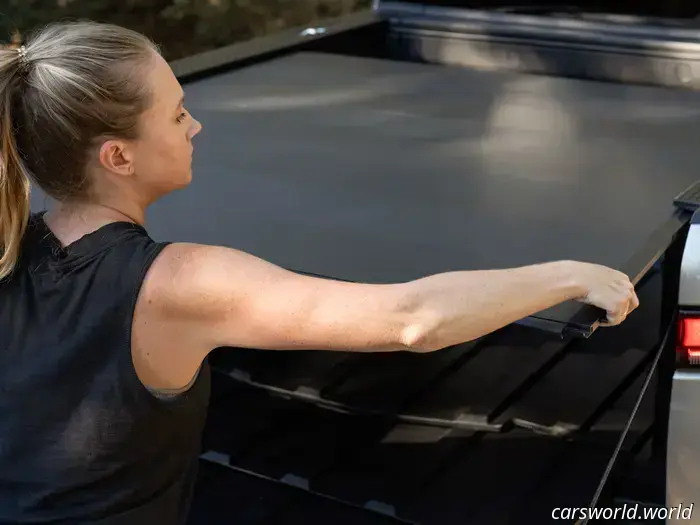 Rivian’s concept for a Tonneau cover awning is a fantastic example of simple yet effective innovation.