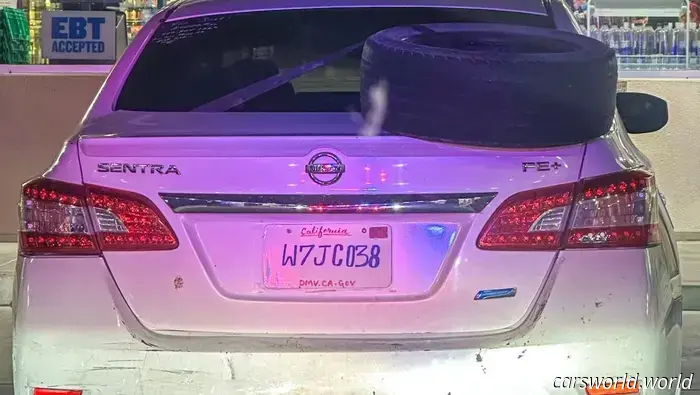 The creator of this Nissan's DIY license plate put in great effort, yet still got caught.