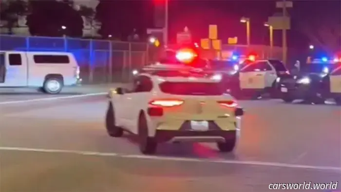 Robotaxi Drives Through LAPD Crime Scene While Suspect Is Held at Gunpoint | Carscoops