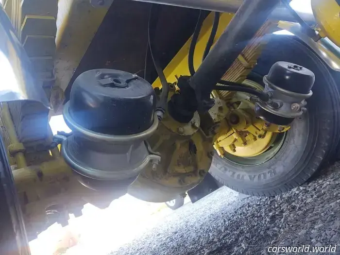 This 1959 IH Semi Truck available for sale features windshields positioned below the driver's knees.