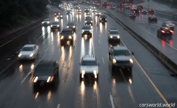 Using your hazard lights while driving in inclement weather could be against the law in your area.