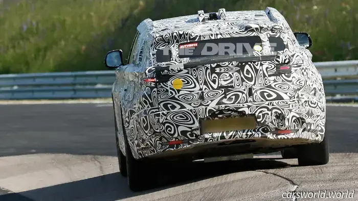 Range Rover Velar EV Caught on Camera with Unusual Aerodynamics and Camouflage