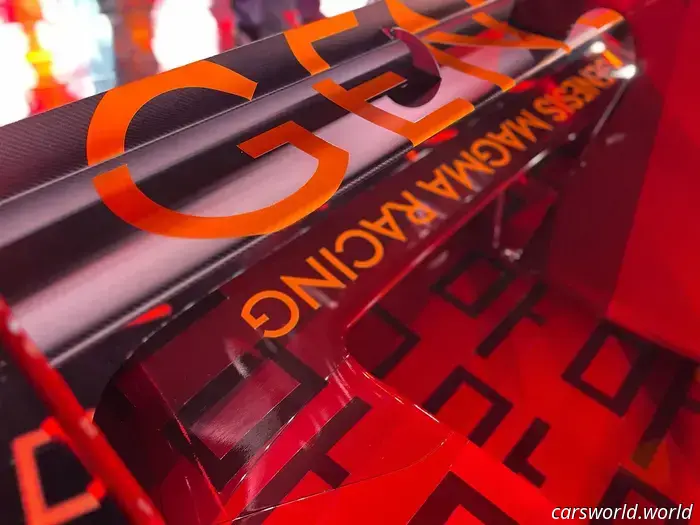 Observe the meticulous process of wrapping a race car.