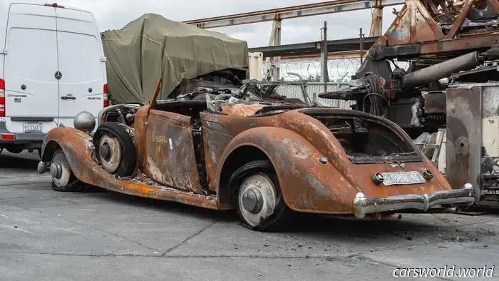 The charred remains of a 1934 Hispano Suiza Concours were sold for $224,000.