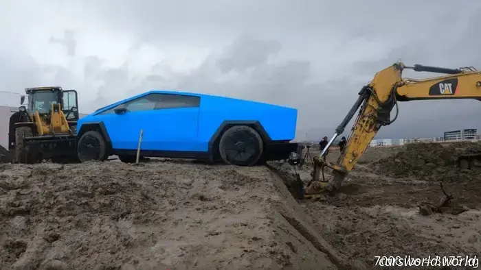 Observe a Tesla Cybertruck being dismantled during a tow hitch stress examination.