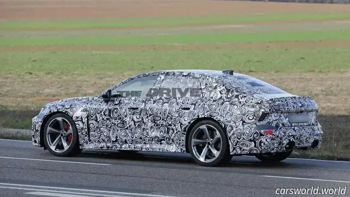 Subscribe to Spyglass: The insider scoop, delivered straight to your inbox.

Your exclusive glimpse into upcoming vehicles and secret prototypes, directly from our spy photographer.

Like many, we appreciate V8-powered wagons. The Audi RS6 is undeniably impressive (even if it weighs as much as a small train), and we’re encouraged by Audi’s recent indications that this formula will continue. Even more exciting are the fresh spy shots of the German powerhouse’s successor.

As if that wasn't exciting enough, our spies have shared more promising news this morning: the RS6 wagon isn’t the only variant returning for 2027; the sedan will be back as well! As a proud member of the sport sedan community (and a Cadillac owner), I’m particularly excited about this development.

We’ve already spotted the new RS6 Avant on two occasions—once for each of the super-wagon’s powertrain options (yes, an electric version is reportedly in the works). A quick look at this prototype clearly identifies it as the RS variant. The distinctive wheel and brake setup is a significant indication, but the flared fenders and open vents, accompanied by oval exhaust tips at the rear, really emphasize its identity. Plus, I must say, it appears pleasantly compact. That’s the 2025 model for you.

Am I imagining things, or is there a hint of early-2000s Subaru Legacy in that rear design? I mean that positively; the 2006 Spec.B showcased an elegant design with clean lines and none of Subaru’s usual exaggerated rally attributes. If I tilt my head a bit, I also see a touch of Saab back there.

Given Audi’s typical release schedule, it may take another year or two before we see any of these variants in the U.S.—and let's face it, the likelihood of the electric model making it here is very slim.

There was a time when the new RS6 Avant was expected to be solely electric, but with the current state of affairs, that plan has been put aside. We reported in June that Audi is likely pursuing a plug-in hybrid version of its 4.0-liter twin-turbo V8. Since both gas-powered prototypes have shown decals suggesting they are equipped with hybrid batteries, this seems to be a certainty.

Have a news tip? Reach out at [email protected]!