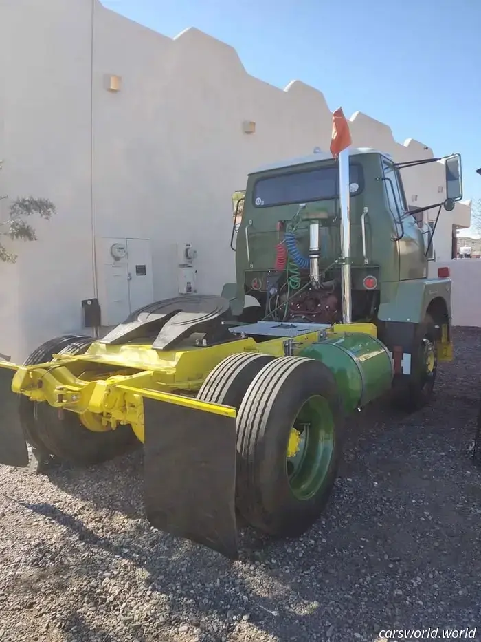 This 1959 IH Semi Truck available for sale features windshields positioned below the driver's knees.