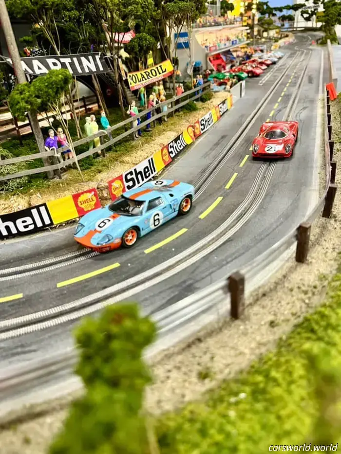 This 1969 Ford GT40 race car features a hidden slot car track within.