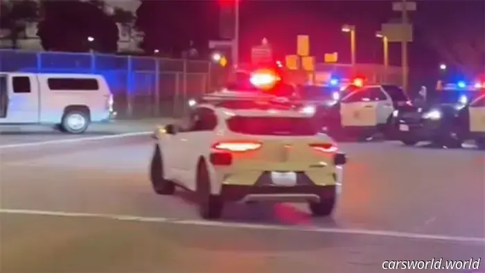 Robotaxi Drives Through LAPD Crime Scene While Suspect Is Held at Gunpoint | Carscoops