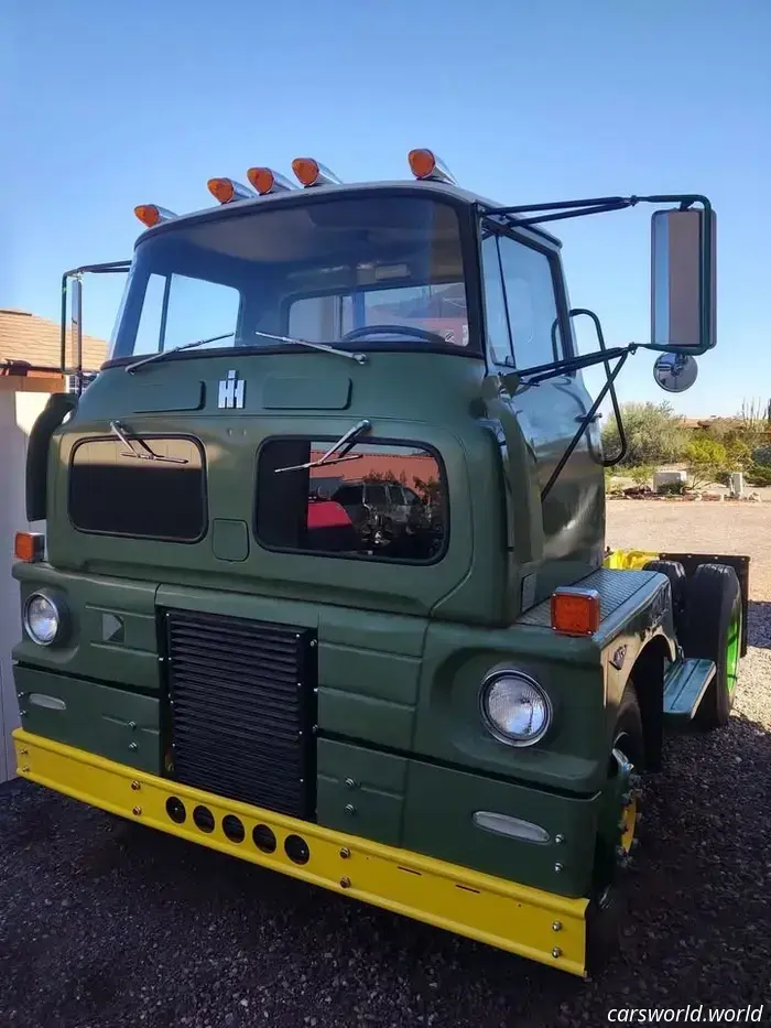 This 1959 IH Semi Truck available for sale features windshields positioned below the driver's knees.