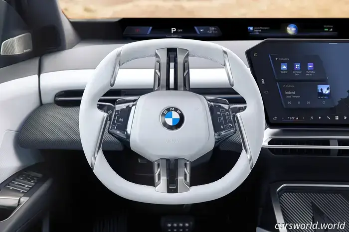 BMW has eliminated the iDrive knob in favor of haptic controls and a full-width display.
