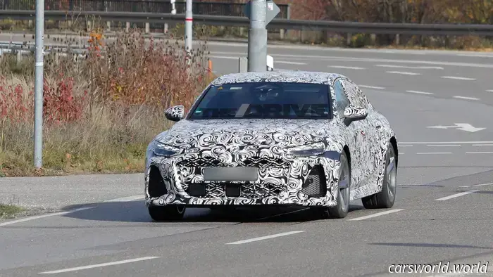 Subscribe to Spyglass: The insider scoop, delivered straight to your inbox.

Your exclusive glimpse into upcoming vehicles and secret prototypes, directly from our spy photographer.

Like many, we appreciate V8-powered wagons. The Audi RS6 is undeniably impressive (even if it weighs as much as a small train), and we’re encouraged by Audi’s recent indications that this formula will continue. Even more exciting are the fresh spy shots of the German powerhouse’s successor.

As if that wasn't exciting enough, our spies have shared more promising news this morning: the RS6 wagon isn’t the only variant returning for 2027; the sedan will be back as well! As a proud member of the sport sedan community (and a Cadillac owner), I’m particularly excited about this development.

We’ve already spotted the new RS6 Avant on two occasions—once for each of the super-wagon’s powertrain options (yes, an electric version is reportedly in the works). A quick look at this prototype clearly identifies it as the RS variant. The distinctive wheel and brake setup is a significant indication, but the flared fenders and open vents, accompanied by oval exhaust tips at the rear, really emphasize its identity. Plus, I must say, it appears pleasantly compact. That’s the 2025 model for you.

Am I imagining things, or is there a hint of early-2000s Subaru Legacy in that rear design? I mean that positively; the 2006 Spec.B showcased an elegant design with clean lines and none of Subaru’s usual exaggerated rally attributes. If I tilt my head a bit, I also see a touch of Saab back there.

Given Audi’s typical release schedule, it may take another year or two before we see any of these variants in the U.S.—and let's face it, the likelihood of the electric model making it here is very slim.

There was a time when the new RS6 Avant was expected to be solely electric, but with the current state of affairs, that plan has been put aside. We reported in June that Audi is likely pursuing a plug-in hybrid version of its 4.0-liter twin-turbo V8. Since both gas-powered prototypes have shown decals suggesting they are equipped with hybrid batteries, this seems to be a certainty.

Have a news tip? Reach out at [email protected]!