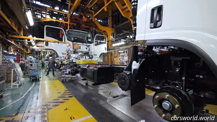 Transition from Rising to Relaxing with This Worker from a Japanese Truck Manufacturing Plant.